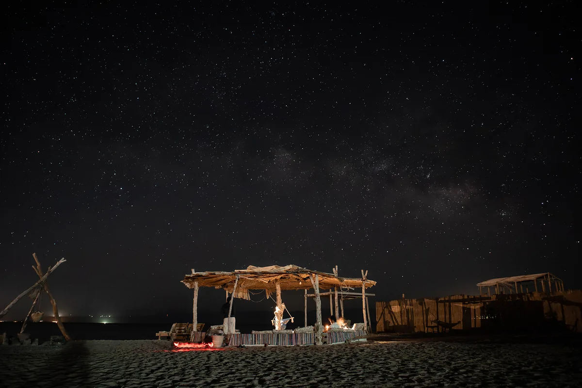 Camp beach area with the Milky Way overhead
