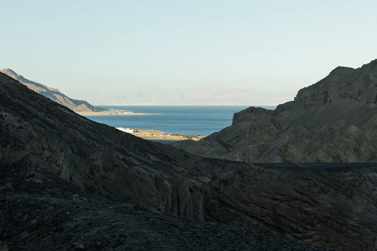 View through a mountain canyon onto the Red Sea